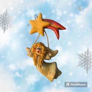 Angel Hanging from a Shooting Star Ornament